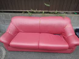 Broken sofa for rubbish disposal