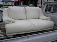 Sofa on way to recycle centre